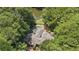 Bird's-eye view of house, pool, and private lake setting at 2341 Habersham Sw Dr, Marietta, GA 30064