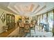 Formal dining room with a large table, chandelier, and hardwood floors at 2341 Habersham Sw Dr, Marietta, GA 30064
