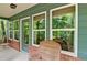 Screened porch with brick flooring and wooded views at 2341 Habersham Sw Dr, Marietta, GA 30064