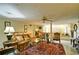 Finished basement with seating area, large area rug, and built-in window seat at 2341 Habersham Sw Dr, Marietta, GA 30064