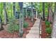 Charming guest house nestled in a wooded setting with brick steps at 2341 Habersham Sw Dr, Marietta, GA 30064