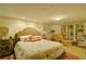 Spacious Primary bedroom with a large bed and built-in shelving at 2341 Habersham Sw Dr, Marietta, GA 30064