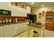 Well-equipped kitchen featuring granite countertops and ample cabinetry at 2341 Habersham Sw Dr, Marietta, GA 30064