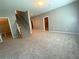 Finished basement with stairs, carpet, and multiple rooms at 617 Vinings Estates Se Dr, Mableton, GA 30126