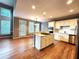 Modern kitchen featuring white cabinets, stainless steel appliances, and an island at 617 Vinings Estates Se Dr, Mableton, GA 30126