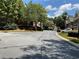 Residential street view with houses and landscaping at 617 Vinings Estates Se Dr, Mableton, GA 30126