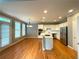 Kitchen and dining area with hardwood floors and lots of natural light at 617 Vinings Estates Se Dr, Mableton, GA 30126