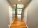 Bright and spacious entryway with hardwood floors and access to other rooms at 617 Vinings Estates Se Dr, Mableton, GA 30126