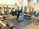 Well-equipped fitness center with various weight machines and free weights at 3334 Peachtree Ne Rd # 1110, Atlanta, GA 30326