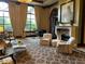 Elegant living room with a fireplace and large windows at 3334 Peachtree Ne Rd # 1110, Atlanta, GA 30326