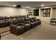 Home theater with brown reclining chairs at 3334 Peachtree Ne Rd # 1110, Atlanta, GA 30326