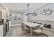 Breakfast nook with built-in banquette seating and chandelier at 2444 Ballantrae Cir, Cumming, GA 30041