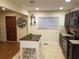 Modern kitchen featuring dark cabinetry, granite counters, and a kitchen island at 2121 Arlington Ne Ave, Atlanta, GA 30324