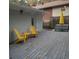 Spacious deck with yellow chairs and a patio table at 2121 Arlington Ne Ave, Atlanta, GA 30324