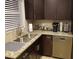 Updated kitchen with granite countertops and stainless steel appliances at 2121 Arlington Ne Ave, Atlanta, GA 30324