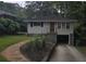 Charming ranch home with attached garage and landscaped yard at 2121 Arlington Ne Ave, Atlanta, GA 30324