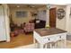 Open living area with hardwood floors, comfy seating, and a charming aesthetic at 2121 Arlington Ne Ave, Atlanta, GA 30324