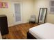 Cozy bedroom with hardwood floors, a full bed, and ample closet space at 2121 Arlington Ne Ave, Atlanta, GA 30324