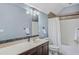 Bathroom with a shower/tub combo and vanity at 1831 Highway 92, Fayetteville, GA 30215