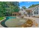 Inviting pool and spa with pergola and patio at 1831 Highway 92, Fayetteville, GA 30215