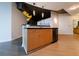 Modern kitchen island with stainless steel appliances at 400 W Peachtree Nw St # 2314, Atlanta, GA 30308