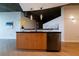 Modern kitchen with island and stainless steel dishwasher at 400 W Peachtree Nw St # 2314, Atlanta, GA 30308