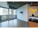 Living room with hardwood floors, city view and balcony access at 400 W Peachtree Nw St # 2314, Atlanta, GA 30308