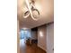 Modern apartment hallway with unique light fixtures at 400 W Peachtree Nw St # 2314, Atlanta, GA 30308