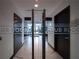 Club Room entrance with glass doors and tiled floor at 400 W Peachtree Nw St # 2314, Atlanta, GA 30308