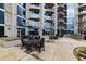Relaxing patio area with seating and fire pit at 400 W Peachtree Nw St # 2314, Atlanta, GA 30308