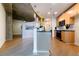 Open concept kitchen with island and hardwood floors at 400 W Peachtree Nw St # 2314, Atlanta, GA 30308