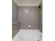 Bathroom with tiled shower and a large soaking tub at 400 W Peachtree Nw St # 2314, Atlanta, GA 30308