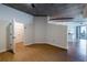 Open living area with hardwood floors and exposed ceiling at 400 W Peachtree Nw St # 2314, Atlanta, GA 30308