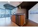 Modern kitchen with wood cabinets, stainless steel dishwasher and granite countertop at 400 W Peachtree Nw St # 2314, Atlanta, GA 30308