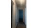 Clean hallway with light walls and carpeted floor at 4356 Housworth Dr, Stonecrest, GA 30038