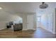 Spacious bonus room with hardwood floors, and plenty of natural light at 158 Watkins Glen Dr, Mcdonough, GA 30252