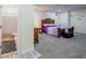 Basement bedroom with ensuite bathroom and plush carpeting at 158 Watkins Glen Dr, Mcdonough, GA 30252
