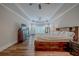 Spacious main bedroom with large windows, hardwood floors and an ensuite bathroom at 158 Watkins Glen Dr, Mcdonough, GA 30252