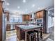Spacious kitchen with island, stainless steel appliances, and hardwood floors at 158 Watkins Glen Dr, Mcdonough, GA 30252