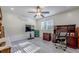 Home office with hardwood floors, built-in desk and plenty of storage at 158 Watkins Glen Dr, Mcdonough, GA 30252