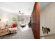 Bright bonus room with cozy seating area and built-in shelving at 510 Church St, Buford, GA 30518