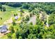 Aerial view of a beautiful community with a pond and lush greenery at , Covington, GA 30014