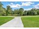 Long concrete driveway leading to a beautiful home at , Covington, GA 30014