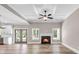 Bright living room with a fireplace and access to the backyard at , Covington, GA 30014