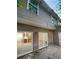 View of the back exterior with sliding glass doors leading inside at 709 Celeste Sw Ln, Atlanta, GA 30331