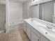 Bathroom with double vanity, soaking tub and separate shower at 709 Celeste Sw Ln, Atlanta, GA 30331