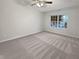 Spacious bedroom with neutral carpeting and a large window at 709 Celeste Sw Ln, Atlanta, GA 30331