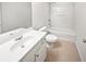 Bathroom with tub shower, single vanity, and tile flooring at 709 Celeste Sw Ln, Atlanta, GA 30331