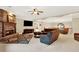 Bright living room with stone fireplace and comfortable seating at 2269 E Cherokee Dr, Woodstock, GA 30188