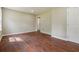 Simple bedroom with hardwood floors and neutral walls at 1847 Ridgeland Dr, Decatur, GA 30032